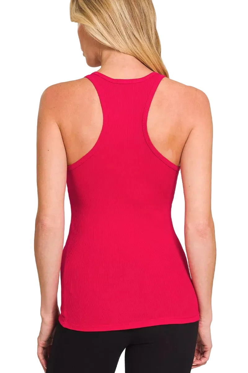 Woman wearing a red tank top on a white background