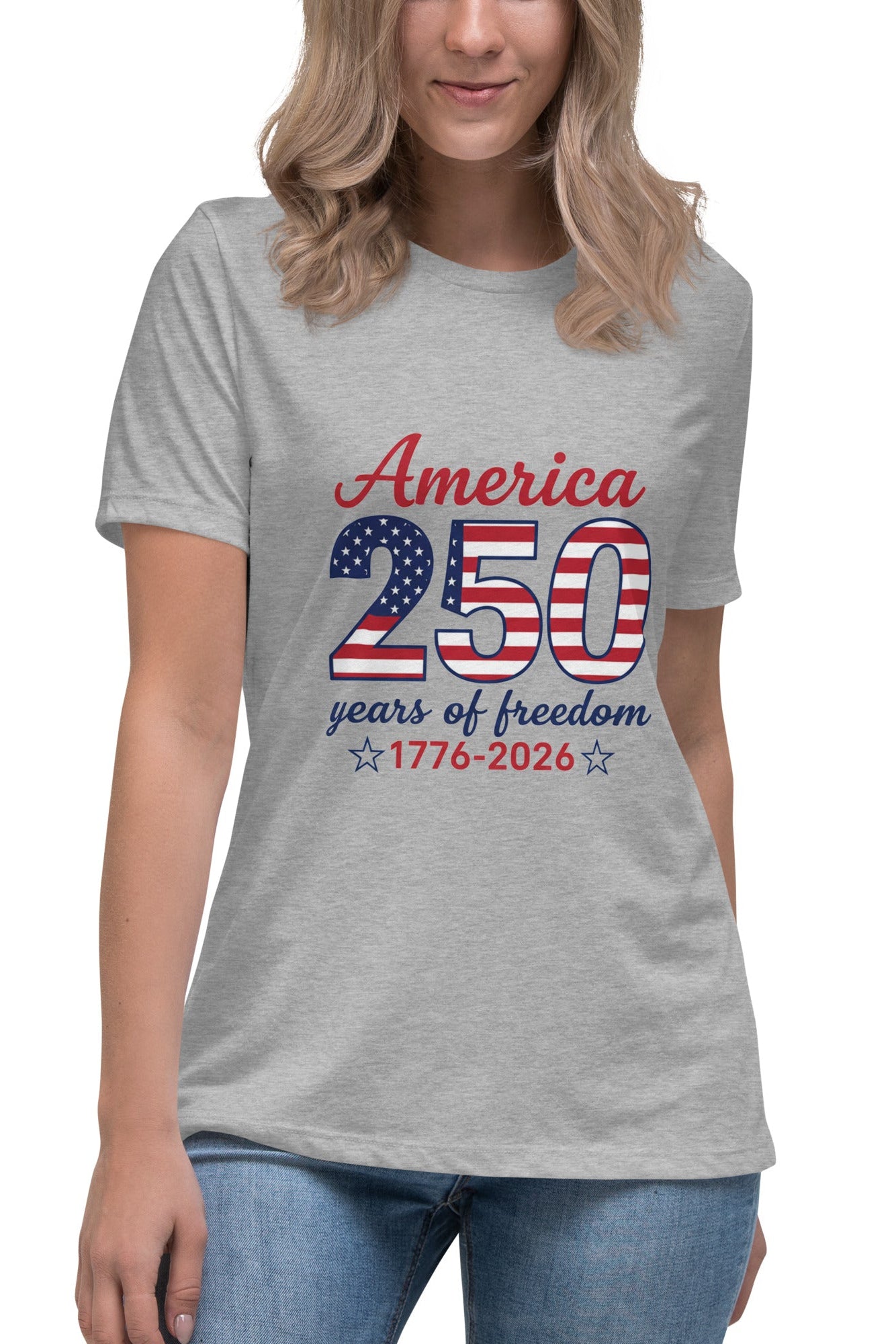 Person wearing a gray t-shirt with 'America 250 years of freedom' design on a white background